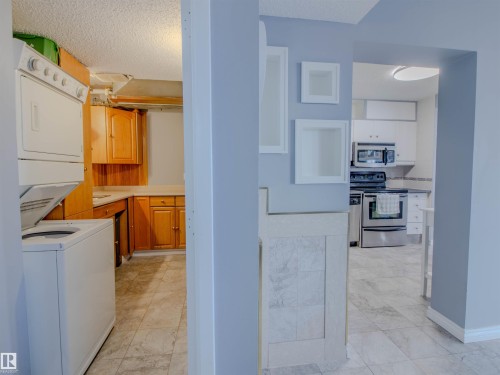 202 8340 Jasper Avenue, Edmonton, AB - Indoor Photo Showing Laundry Room