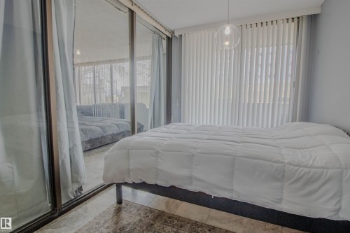 202 8340 Jasper Avenue, Edmonton, AB - Indoor Photo Showing Bedroom