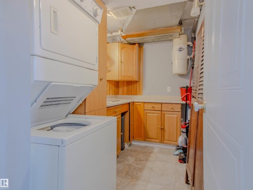 202 8340 Jasper Avenue, Edmonton, AB - Indoor Photo Showing Laundry Room