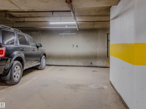 202 8340 Jasper Avenue, Edmonton, AB - Indoor Photo Showing Garage