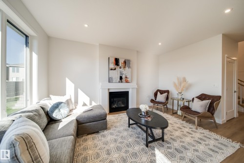 77 Chartres Close, St. Albert, AB - Indoor Photo Showing Living Room With Fireplace
