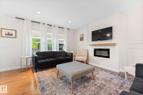 5152 4 Avenue, Edmonton, AB - Indoor Photo Showing Living Room With Fireplace