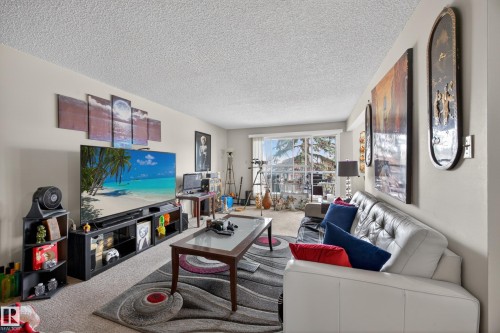 209 4503 51 Street, Leduc, AB - Indoor Photo Showing Living Room