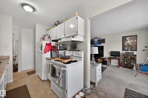209 4503 51 Street, Leduc, AB - Indoor Photo Showing Kitchen
