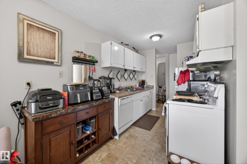 209 4503 51 Street, Leduc, AB - Indoor Photo Showing Kitchen