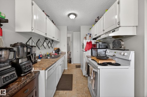 209 4503 51 Street, Leduc, AB - Indoor Photo Showing Kitchen With Double Sink