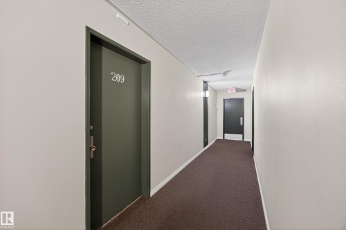 209 4503 51 Street, Leduc, AB - Indoor Photo Showing Other Room