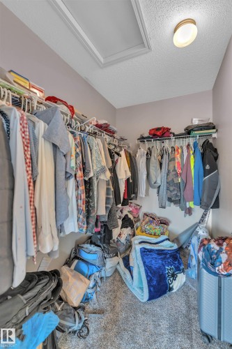 View of spacious closet - 6152 13 Avenue, Edmonton, AB - Indoor With Storage