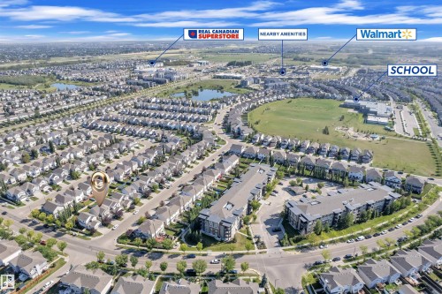 View of property location featuring a nearby body of water and nearby suburban area - 6152 13 Avenue, Edmonton, AB - Outdoor With View