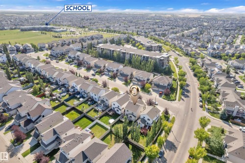 Aerial view of property and surrounding area featuring nearby suburban area - 6152 13 Avenue, Edmonton, AB - Outdoor With View