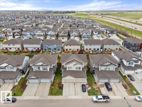 Aerial view of a residential community featuring multiple detached homes with varying architectural styles - 236 39 Avenue, Edmonton, AB - Outdoor With View