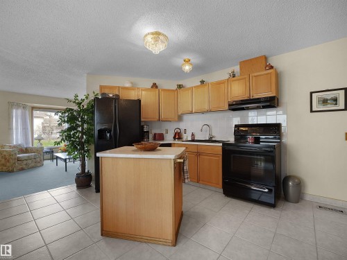 10711 24 Avenue, Edmonton, AB - Indoor Photo Showing Kitchen