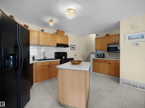 10711 24 Avenue, Edmonton, AB - Indoor Photo Showing Kitchen