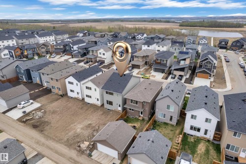 Aerial perspective showcasing a developing residential community - 17330 6A Street Ne, Edmonton, AB - Outdoor With View