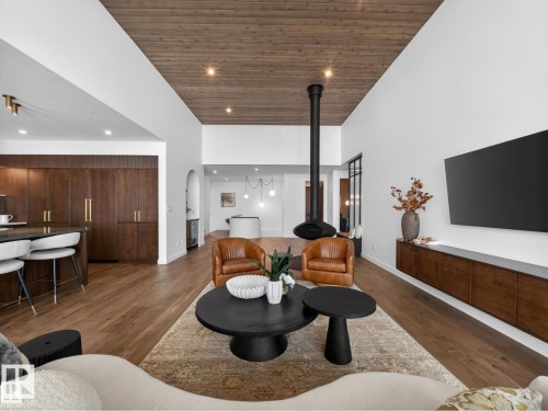 Vaulted wood-paneled ceiling with recessed lighting - 7104 54 Avenue, Beaumont, AB - Indoor Photo Showing Living Room