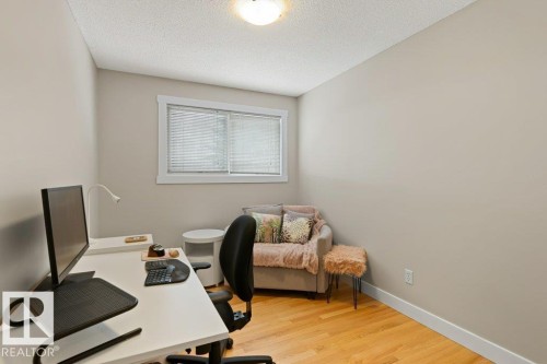 This room features light-colored walls and hardwood flooring - 7 Ash Place, St. Albert, AB - Indoor Photo Showing Office