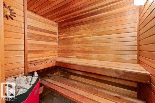 The property features a sauna with wooden paneling on the walls and ceiling, including built-in wooden benches - 7 Ash Place, St. Albert, AB - Indoor Photo Showing Other Room