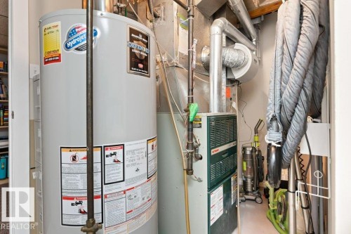 This property includes a water heater and a furnace, both essential for comfort - 7 Ash Place, St. Albert, AB - Indoor Photo Showing Basement