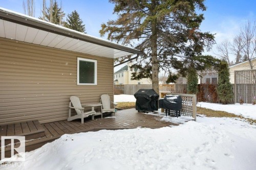 The property features an exterior with horizontal siding and a deck with steps - 7 Ash Place, St. Albert, AB - Outdoor With Deck Patio Veranda With Exterior
