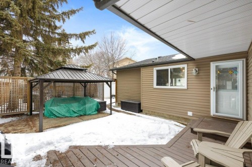 The property features a spacious backyard with a gazebo, a deck, and exterior siding - 7 Ash Place, St. Albert, AB - Outdoor With Deck Patio Veranda With Exterior