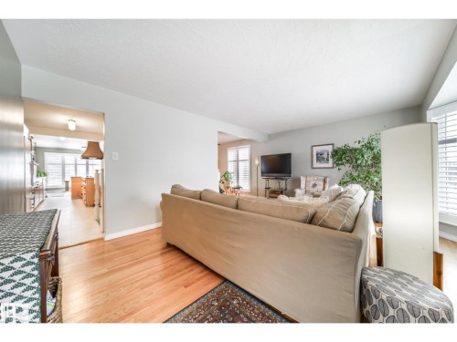 Hardwood flooring throughout the main living area - 10231 46 Street, Edmonton, AB 