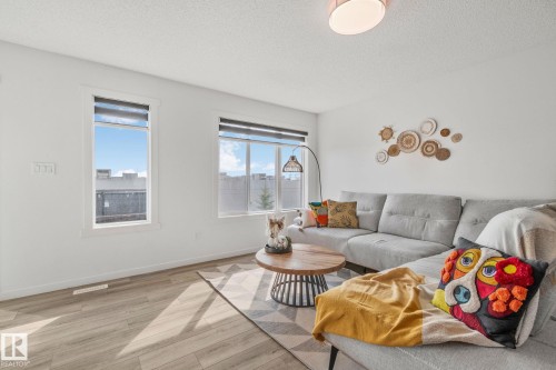 60A 1530 Tamarack Boulevard, Edmonton, AB - Indoor Photo Showing Living Room