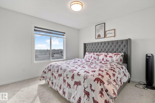 60A 1530 Tamarack Boulevard, Edmonton, AB - Indoor Photo Showing Bedroom