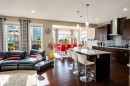 Open-concept living space featuring rich wood-finish flooring throughout - 1728 53 Street, Edmonton, AB  - Indoor 