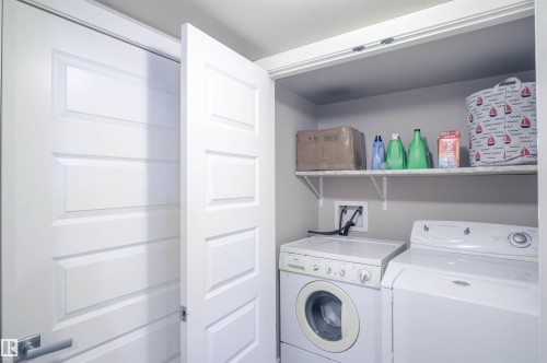 Utility closet featuring a white shelf and appliances - 1728 53 Street, Edmonton, AB - Indoor Photo Showing Laundry Room