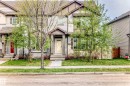 Two-story townhome with light siding and dark trim accents - 328 Watt Boulevard, Edmonton, AB  - Outdoor 
