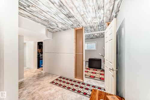Wood-finish ceiling with recessed lighting - 328 Watt Boulevard, Edmonton, AB - Indoor