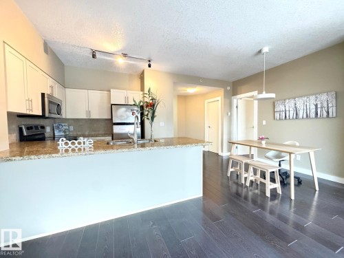 702 10136 104 Street, Edmonton, AB - Indoor Photo Showing Kitchen With Double Sink