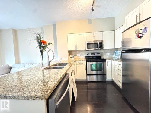 702 10136 104 Street, Edmonton, AB - Indoor Photo Showing Kitchen With Double Sink With Upgraded Kitchen