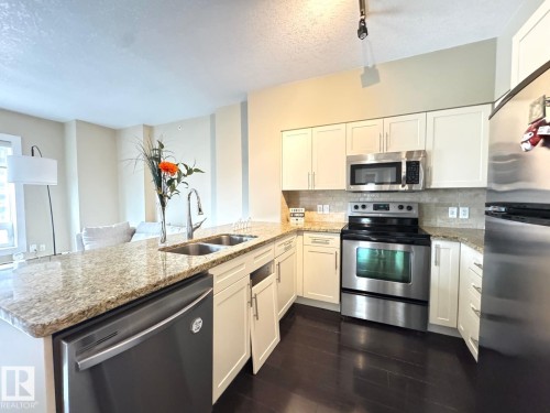 702 10136 104 Street, Edmonton, AB - Indoor Photo Showing Kitchen With Double Sink