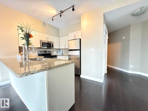 702 10136 104 Street, Edmonton, AB - Indoor Photo Showing Kitchen With Double Sink With Upgraded Kitchen