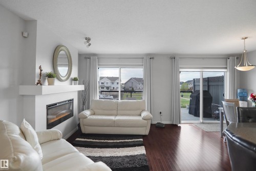 1702 Chapman Way, Edmonton, AB - Indoor Photo Showing Living Room With Fireplace