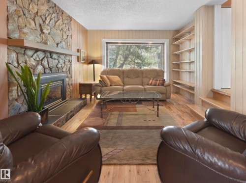 9202 117 Street, Edmonton, AB - Indoor Photo Showing Living Room With Fireplace