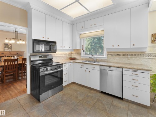 9202 117 Street, Edmonton, AB - Indoor Photo Showing Kitchen With Double Sink