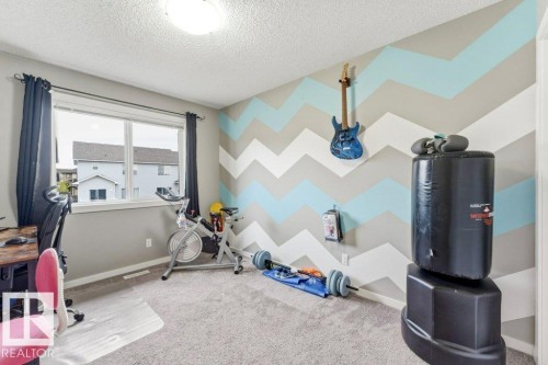 4443 6 Street Nw, Edmonton, AB - Indoor Photo Showing Gym Room