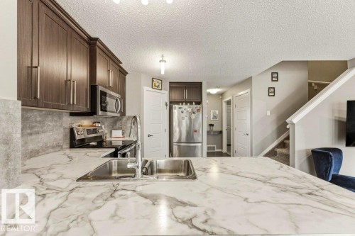 4443 6 Street Nw, Edmonton, AB - Indoor Photo Showing Kitchen With Double Sink