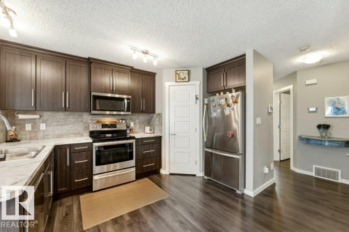 4443 6 Street Nw, Edmonton, AB - Indoor Photo Showing Kitchen With Double Sink