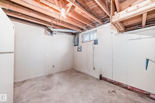 Unfinished basement space featuring exposed wood joists and concrete flooring - 79 Broadview Crescent, St. Albert, AB - Indoor Photo Showing Basement