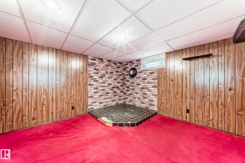 Room featuring wood paneling, a drop ceiling, and recessed lighting - 79 Broadview Crescent, St. Albert, AB - Indoor Photo Showing Other Room