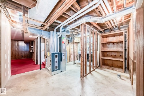Unfinished basement featuring exposed wood joists and concrete flooring - 79 Broadview Crescent, St. Albert, AB - Indoor Photo Showing Basement