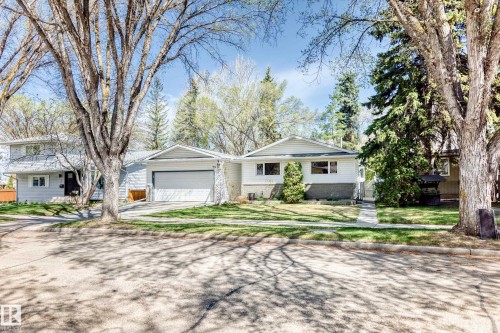 Single-story residence featuring light-colored siding and a contrasting stone foundation - 79 Broadview Crescent, St. Albert, AB - Outdoor With Facade