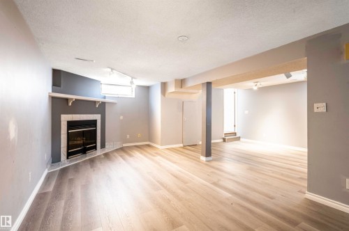 9331 52 Street, Edmonton, AB - Indoor With Fireplace