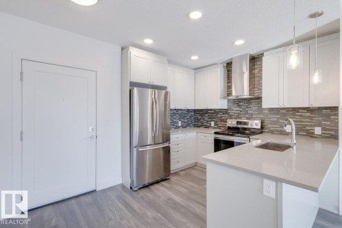 317 1316 Winderemere Way, Edmonton, AB - Indoor Photo Showing Kitchen With Stainless Steel Kitchen With Upgraded Kitchen