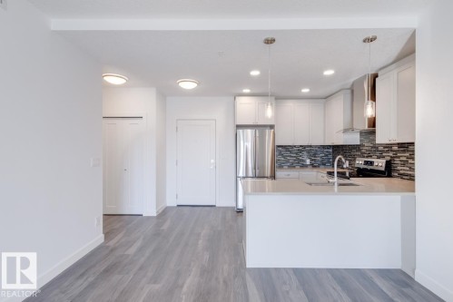 317 1316 Winderemere Way, Edmonton, AB - Indoor Photo Showing Kitchen With Upgraded Kitchen