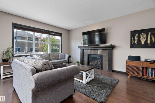 268 Sheppard Circle, Leduc, AB - Indoor Photo Showing Living Room With Fireplace