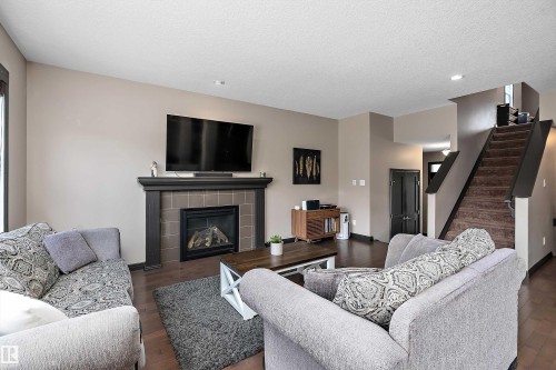 268 Sheppard Circle, Leduc, AB - Indoor Photo Showing Living Room With Fireplace